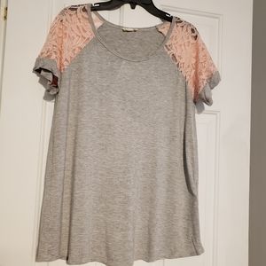 Flamingo Urban Boutique pink lace and grey shirt.
